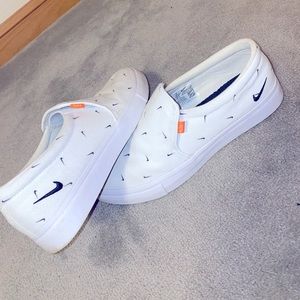 Nike slip-ons.